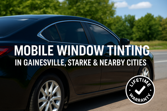 Mobile window tinting services in Gainesville, Starke, and North Florida – professional car with dark tinted windows parked under sunny Florida skies