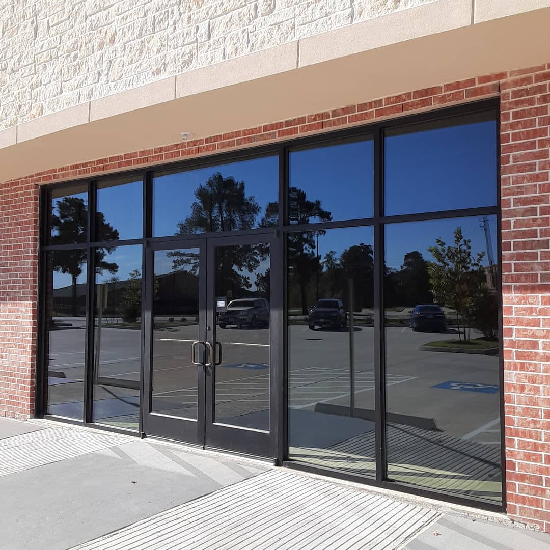 Commercial building with professionally installed solar control window film by Tint Werkz, serving residential and commercial clients in Gainesville FL