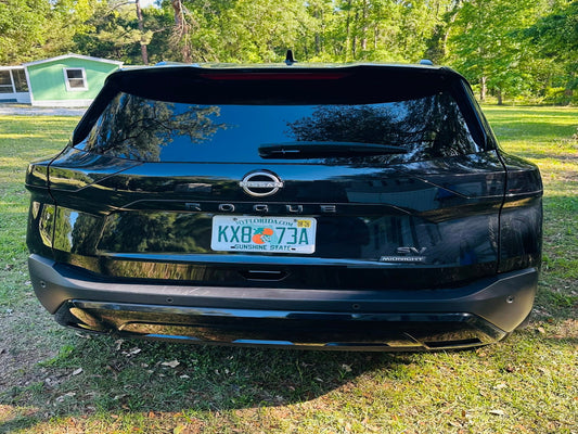 Tinted brake lights on a 2023 Nissan Rogue customized by Tint Werkz for a sleek, smoked appearance
