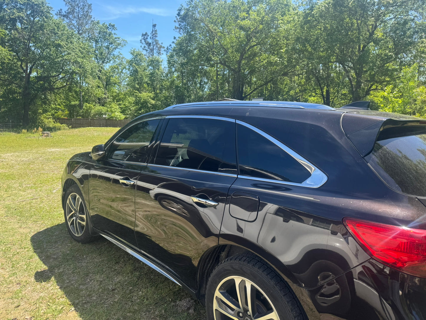 Acura MDX with professional window tint installed by Tint Werkz using carbon film for style and UV protection